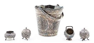 A Persian Silver Pail, Maker Unknown, with a swing handle, chased to show exotic birds among foliage and arabesques, together wi