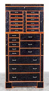 An Osvaldo Agresti Jewelry Cabinet Height 50 1/2 x width 22 1/2 x depth 14 5/8 inches.