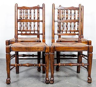 * A Set of Four Lancashire Chairs Height 38 inches.