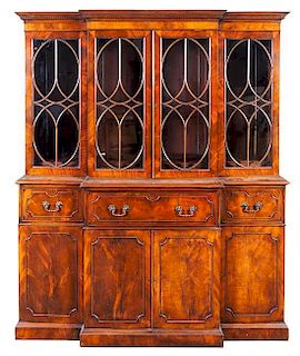 A Regency Style Mahogany Breakfront Height 79 1/4 x width 63 x depth 17 3/4 inches.