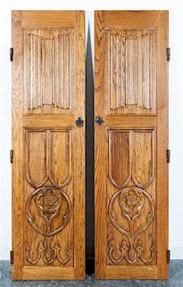 Two Gothic Revival Oak Doors. Height 76 1/2 x width 21 1/2 inches.