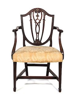 * A Sheraton Walnut Open Armchair Height 36 3/4 inches.