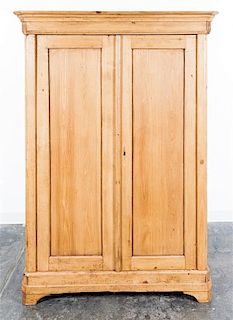 An American Pine Armoire Height 72 1/4 x width 50 x depth 21 3/4 inches.