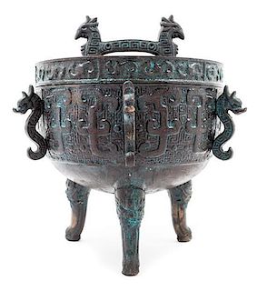 A Chinese Style Cast Metal Vessel Height 7 inches.
