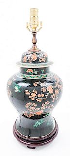 A Chinese Ceramic Lidded Vase Height overall 20 inches.