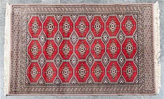 A Bokhara Wool Rug 6 feet 5 inches x 4 feet 2 inches.
