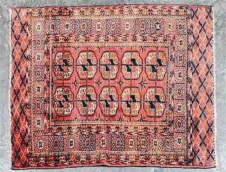 A Bokhara Wool Mat 3 feet 2 inches x 3 feet 9 1/2 inches.