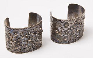 Pair of Silver Navajo Cuff Bracelets with Repousee