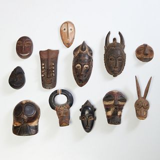 Group West African style carved maskettes