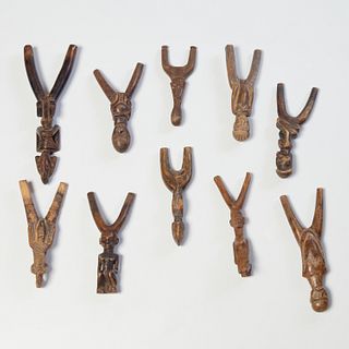 Group (10) African carved wood slingshots