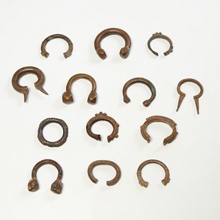 Group (13) bronze West African currency cuffs