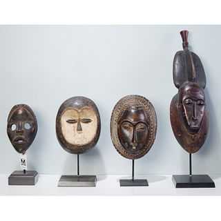 Group (4) West African carved wood masks