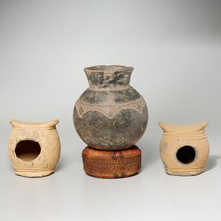 Pair Nigerian clay neck rests and a Nupe pot