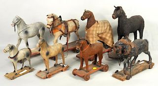 Eight Early Horse Pull Toys