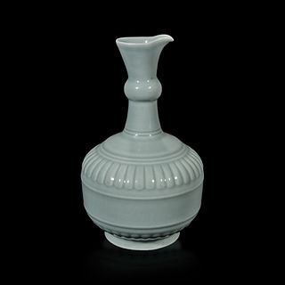 A Chinese "claire de lune" or pale celadon-glazed pouring vessel