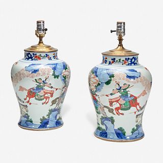 A pair of large Chinese wucai-decorated porcelain jars, mounted as lamps 五彩人物大罐改装台灯一对