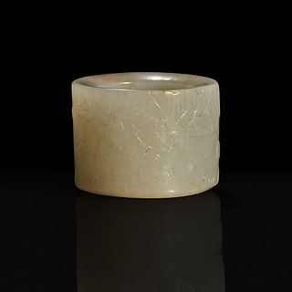 A large pale celadon and russet jade archer ring with Imperial poem and hunting scene 乾隆御题诗狩猎图玉扳指 Qing Dynasty 清