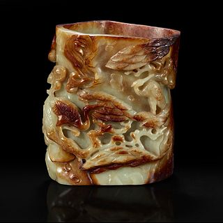 A Chinese carved russet and celadon jade brush holder 青玉笔筒