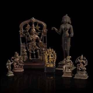 A group of seven assorted Indian and Himalayan bronzes 印度及喜马拉雅铜佛造像一组七件 17th/18th century and later 十七至十八世纪或更晚