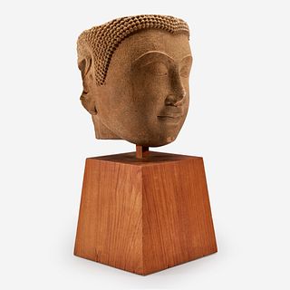 A Thai carved sandstone head of a Buddha泰国石雕佛首