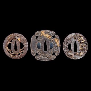 A group of three Japanese gold-inlaid iron tsuba, one signed 日本嵌金刀镡一组三件 一件带签字 Edo to early Meiji period 江户至明治