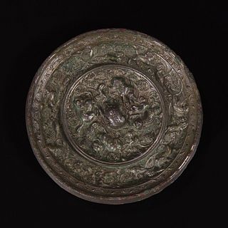 An unusual Chinese "Beast and Grapes" bronze mirror 海兽葡萄纹铜镜 Tang dynasty 唐