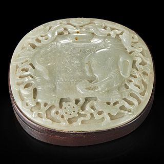 A Chinese carved celadon jade "Elephant" plaque mounted as a box 木盒嵌太平有象浮雕玉板 