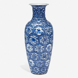 A Chinese blue and white porcelain molded vase decorated with Buddhist symbols and figures 青花佛家八宝瓶 19th century 十九世纪
