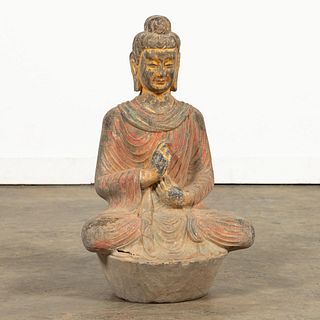 SOUTHEAST ASIAN POLYCHROME STONE SEATED BUDDHA