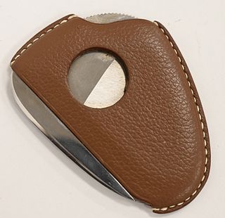 Hermes Leather Cigar Cutter, marked Hermes Paris and poe inox. 
