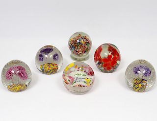 GROUP OF SIX GLASS PAPERWEIGHTS