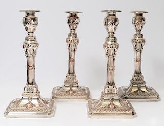 SET OF FOUR SHEFFIELD PLATED CANDLESTICKS