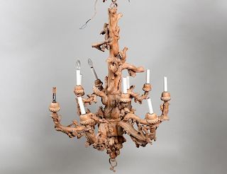 TEN LIGHT CARVED AND BLEACHED WOOD CHANDELIER