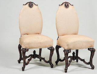 SET OF FOUR RENAISSANCE STYLE CARVED WALNUT SIDE CHAIRS
