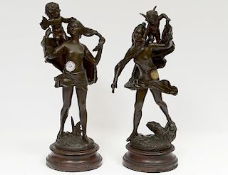 PAIR OF PATINATED WHITE METAL FIGURAL GROUPS