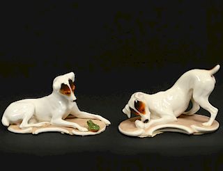 PAIR OF NYMPHENBURG PORCELAIN DOGS