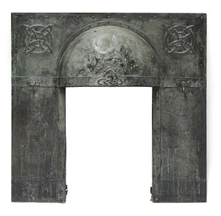 An Arts and Crafts verdigris patinated fireplace insert,
