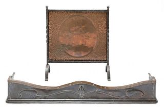 An Arts and Crafts bronze and copper fender,