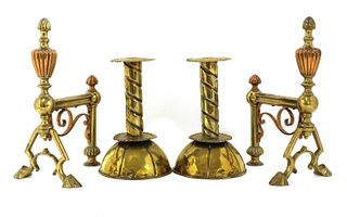 A pair of Arts and Crafts brass candlesticks,