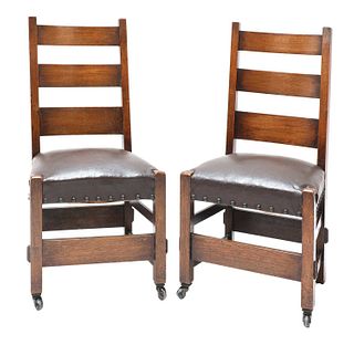A pair of American Arts and Crafts oak side chairs,