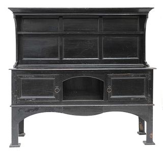 An Arts and Crafts ebonised sideboard,