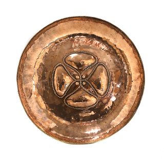 An Arts and Crafts copper dish,