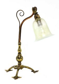 An Arts and Crafts copper and brass table lamp,
