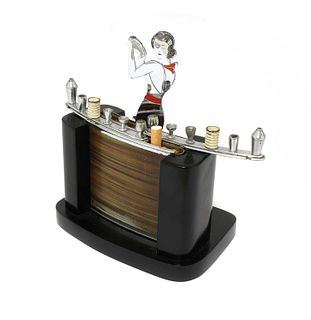 An Art Deco ‘barmaid’ cigarette dispenser stand,