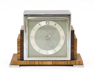 An Art Deco walnut and rosewood mantel clock,