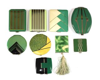 Nine Art Deco design green enamelled and coloured compacts,