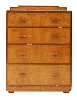 An Art Deco walnut and maple chest of drawers,