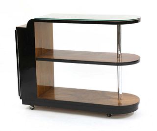 An Art Deco walnut and ebonised stand,