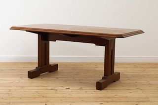 An Art Deco mahogany 'Token Works' dining table,