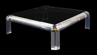 A Lucite coffee table,